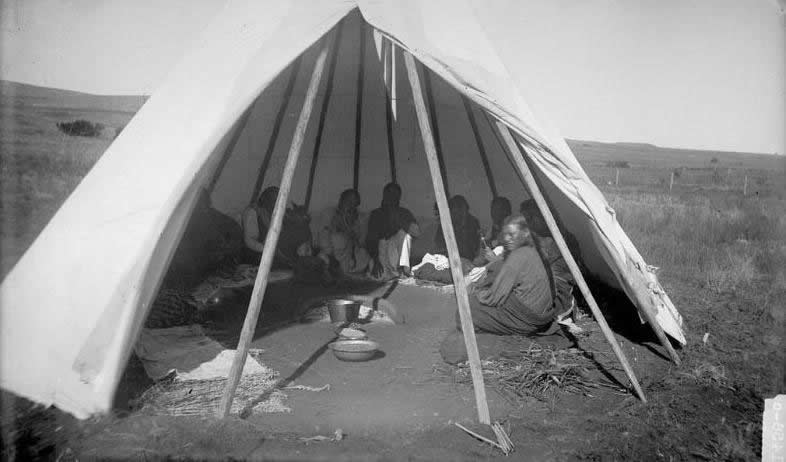A historic photograph of an Indigenous encampment